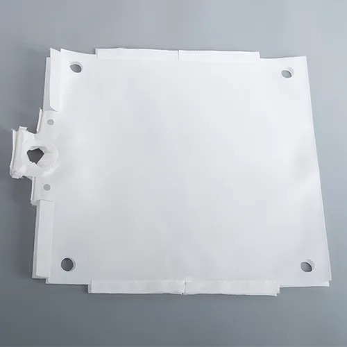 Filter cloth opening and edge treatment detail